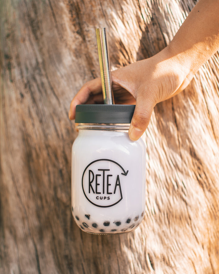 Taro milk tea with tapioca in a reusable bubble tea cup