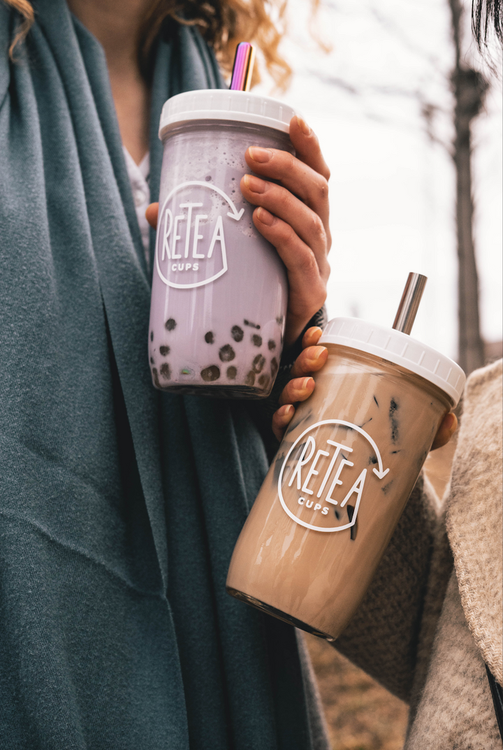 Two bubble teas in reusable cups. Taro milk tea and Milk Tea