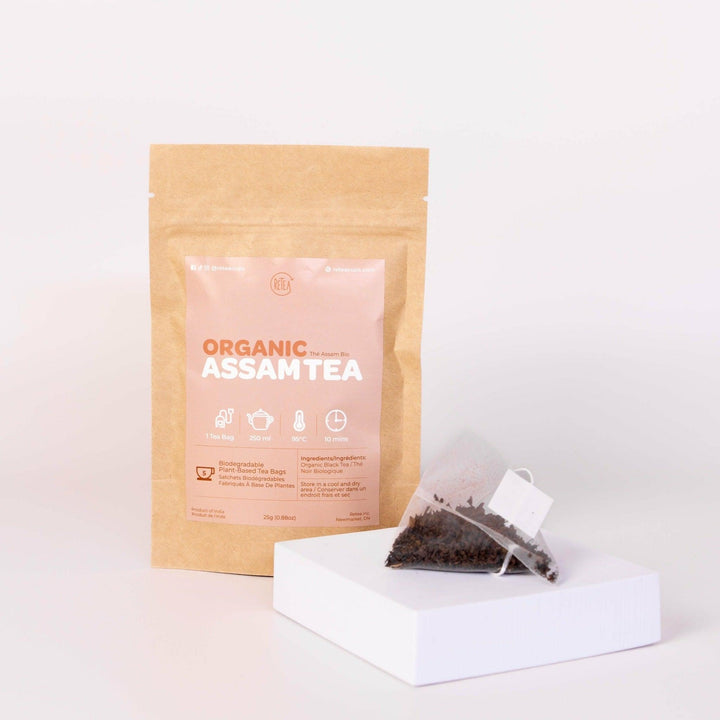 Recyclable paper packaged organic assam tea, 5 tea bags, 25 grams total, biodegradable plant-based tea bag with assam black tea display in front